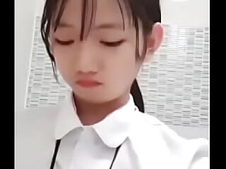 Cute Asian College Girl masturbates using toothbrush